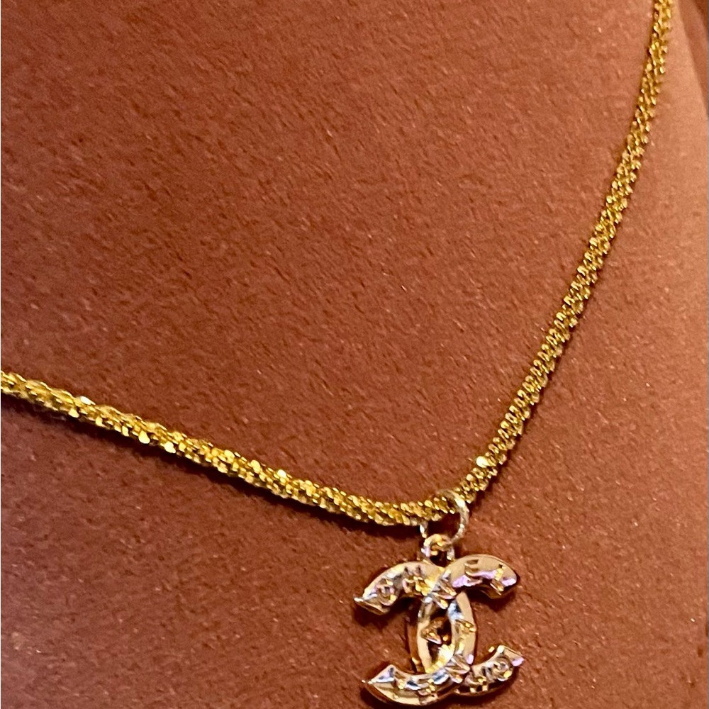 CHANEL Gold Necklace with Signature Emblem
